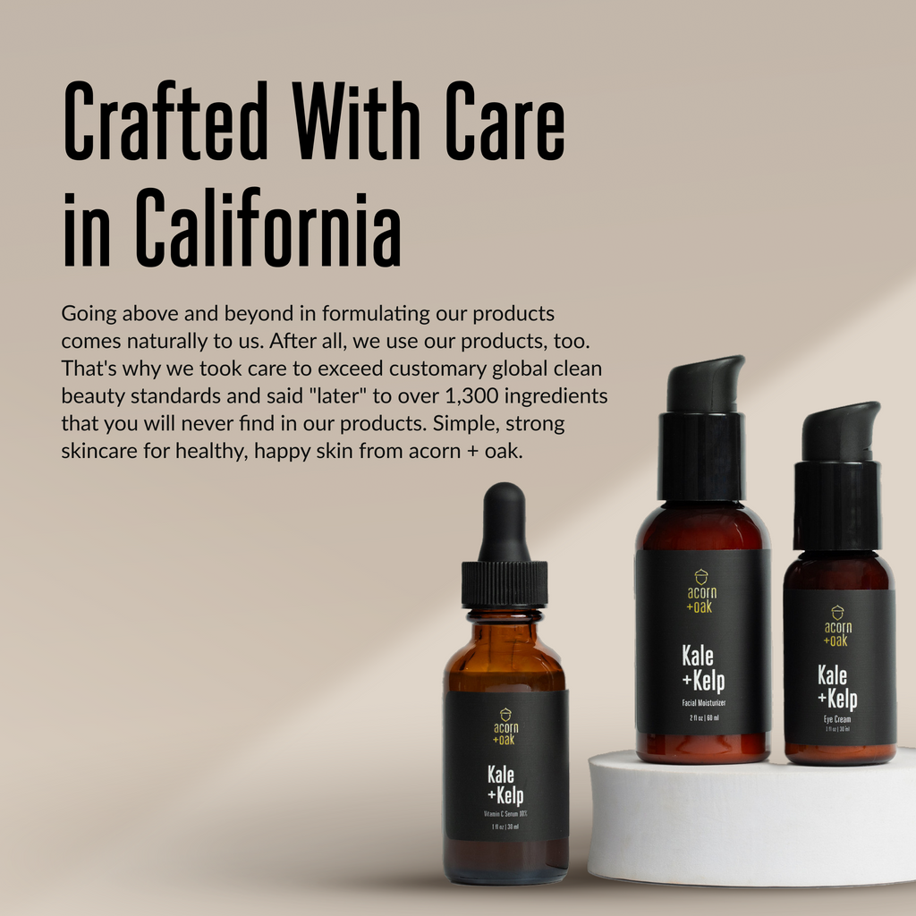 Three acorn+oak skincare bottles with black labels on a beige background, featuring text about product formulation.