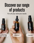 Three acorn+oak skincare product bottles held by hands with text describing their benefits on a neutral background.